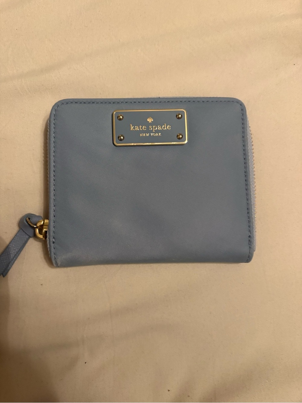 kate spade light blue small zip wallet with gold plaque
